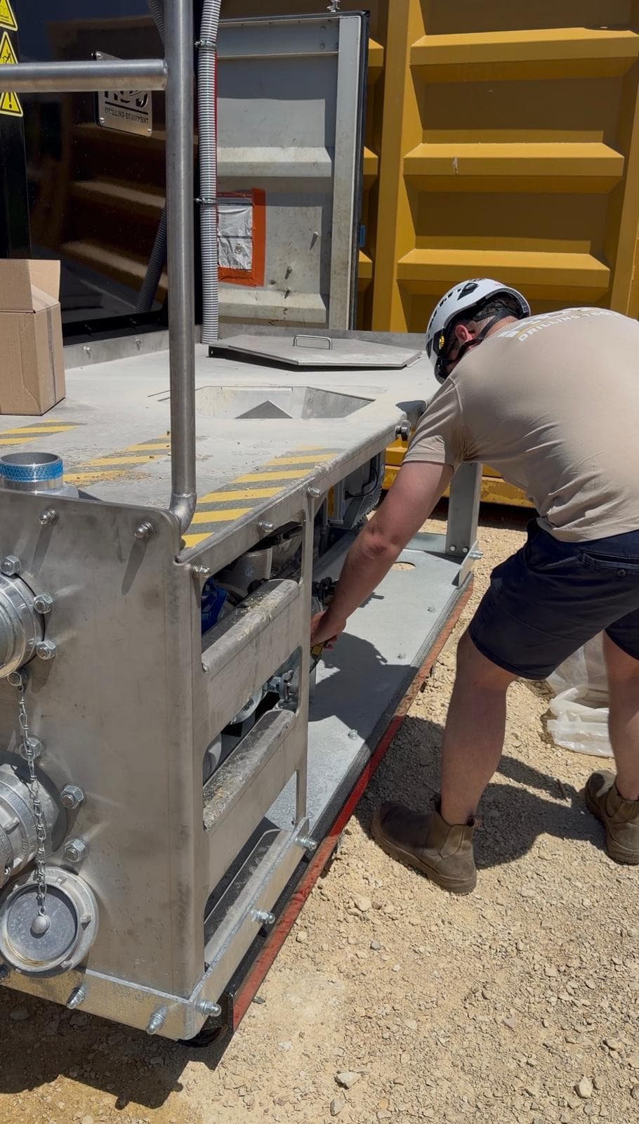 Service engineer working on equipment on site